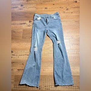 Distressed Blue flared men’s jean